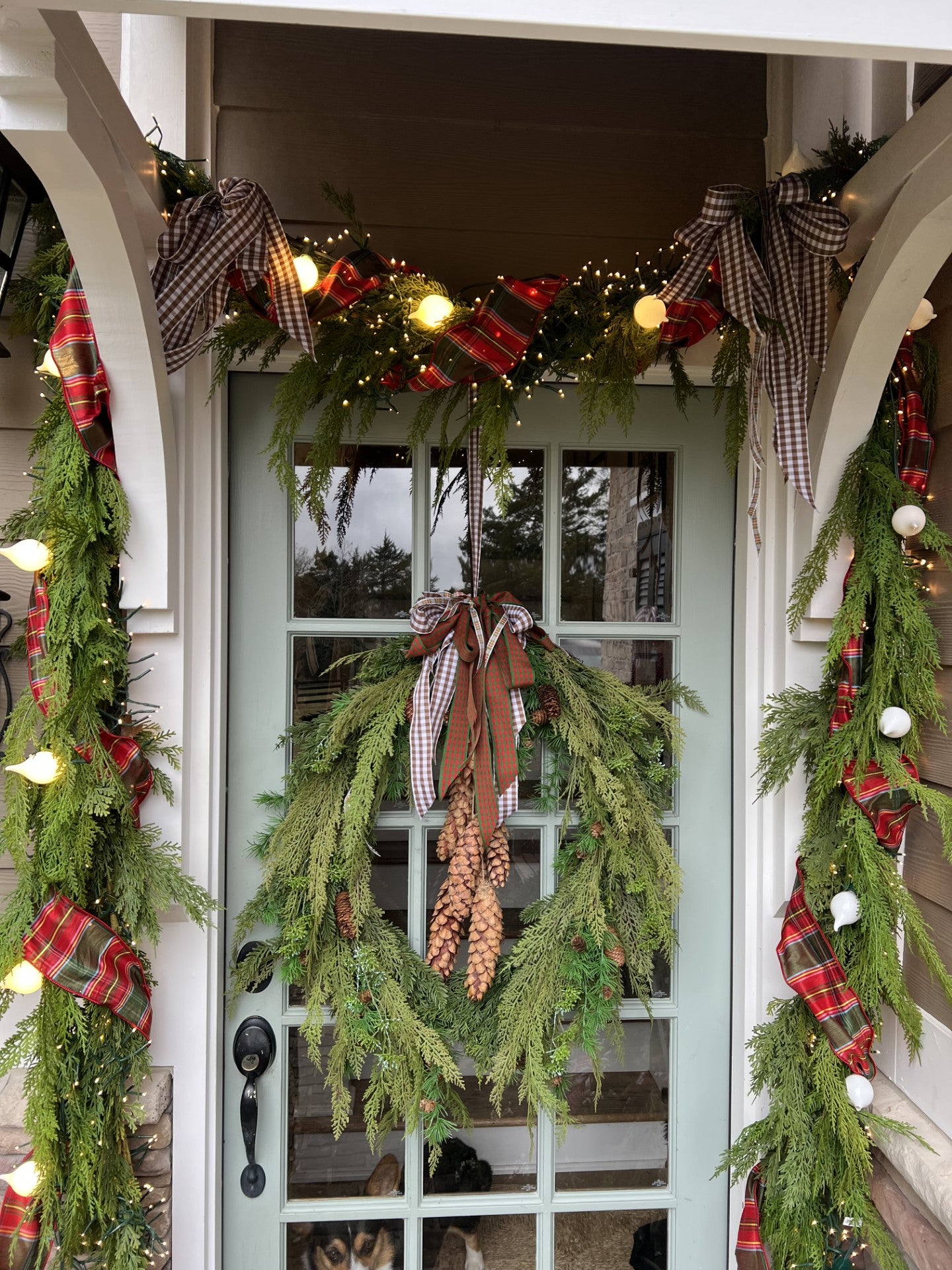 stunning oval cedar and pinecone wreath