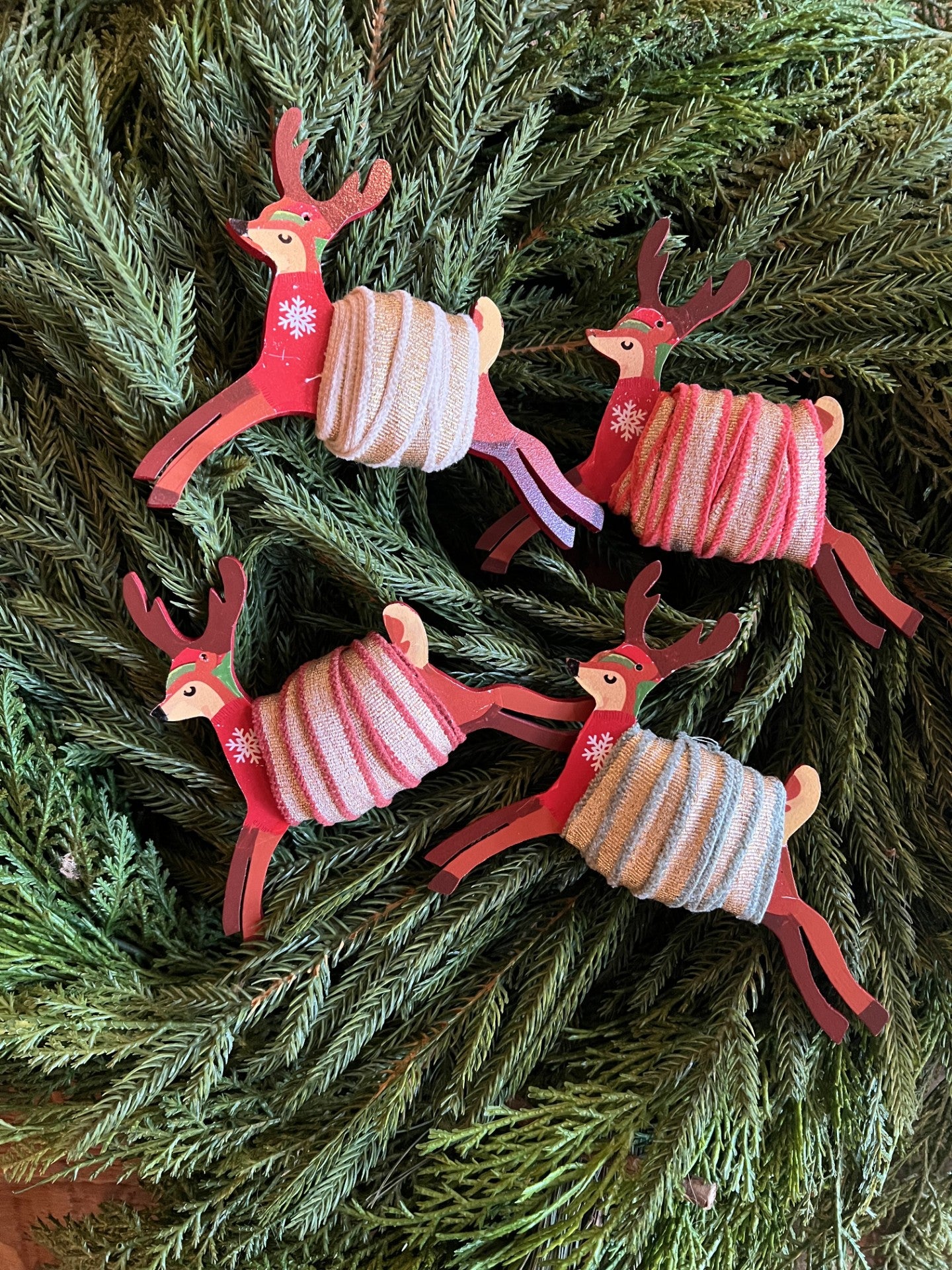 5 yards of sparkly ribbon on an adorable wooden reindeer