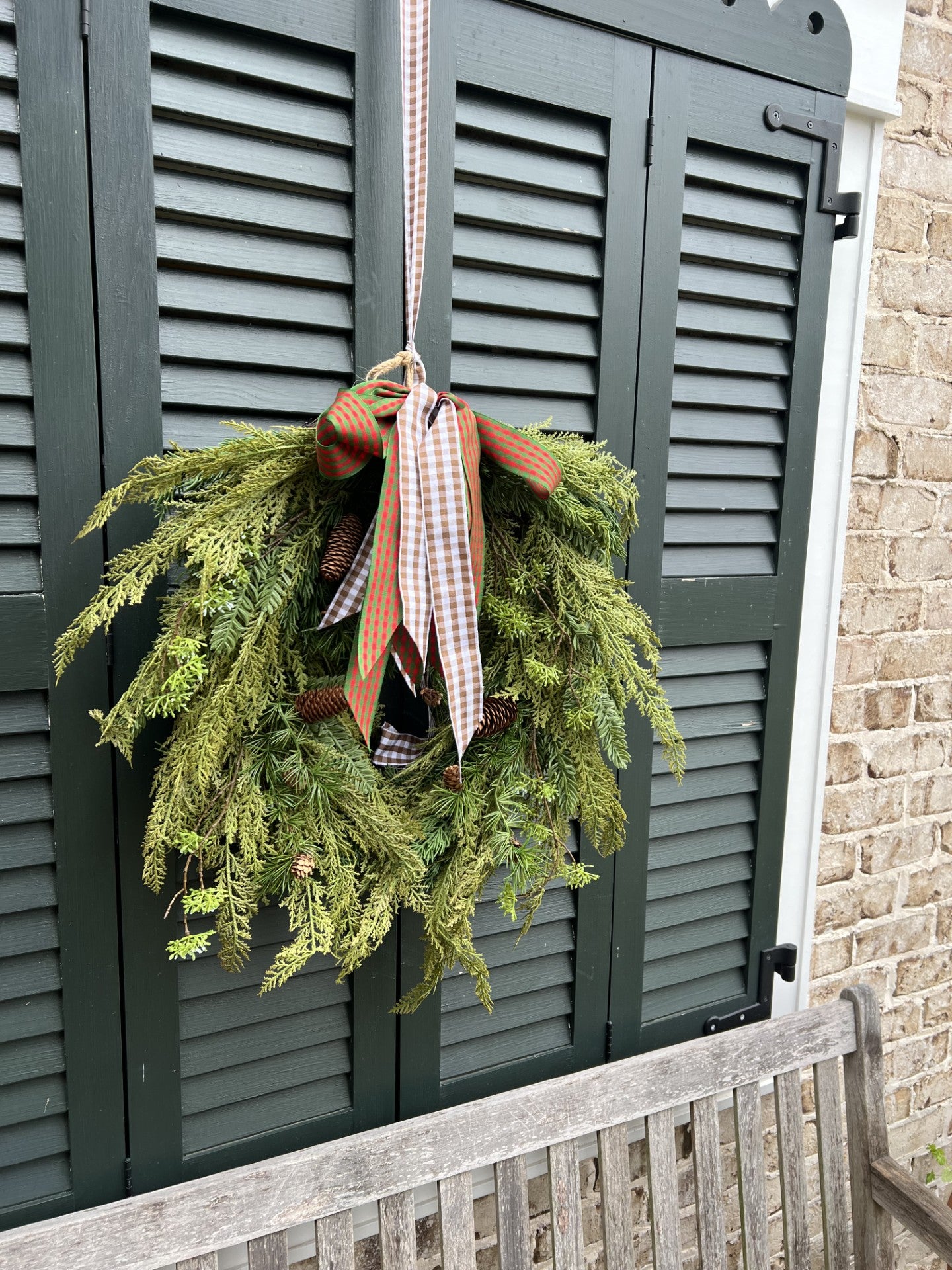 stunning oval cedar and pinecone wreath