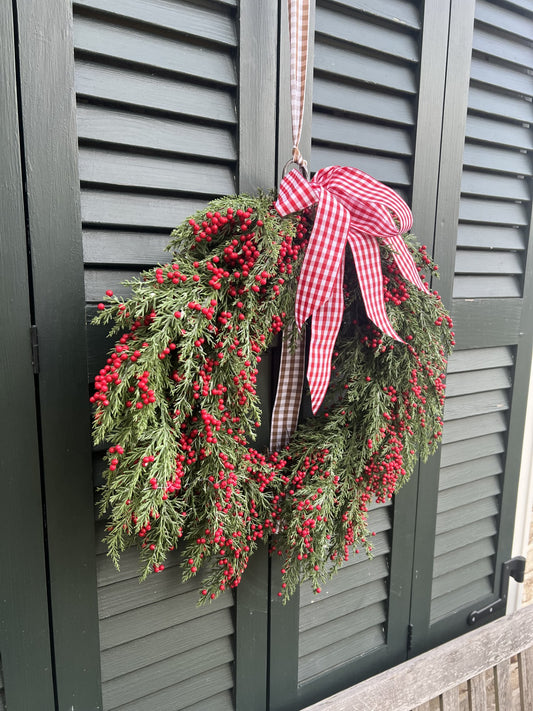 beautiful wreath with tiny red berries