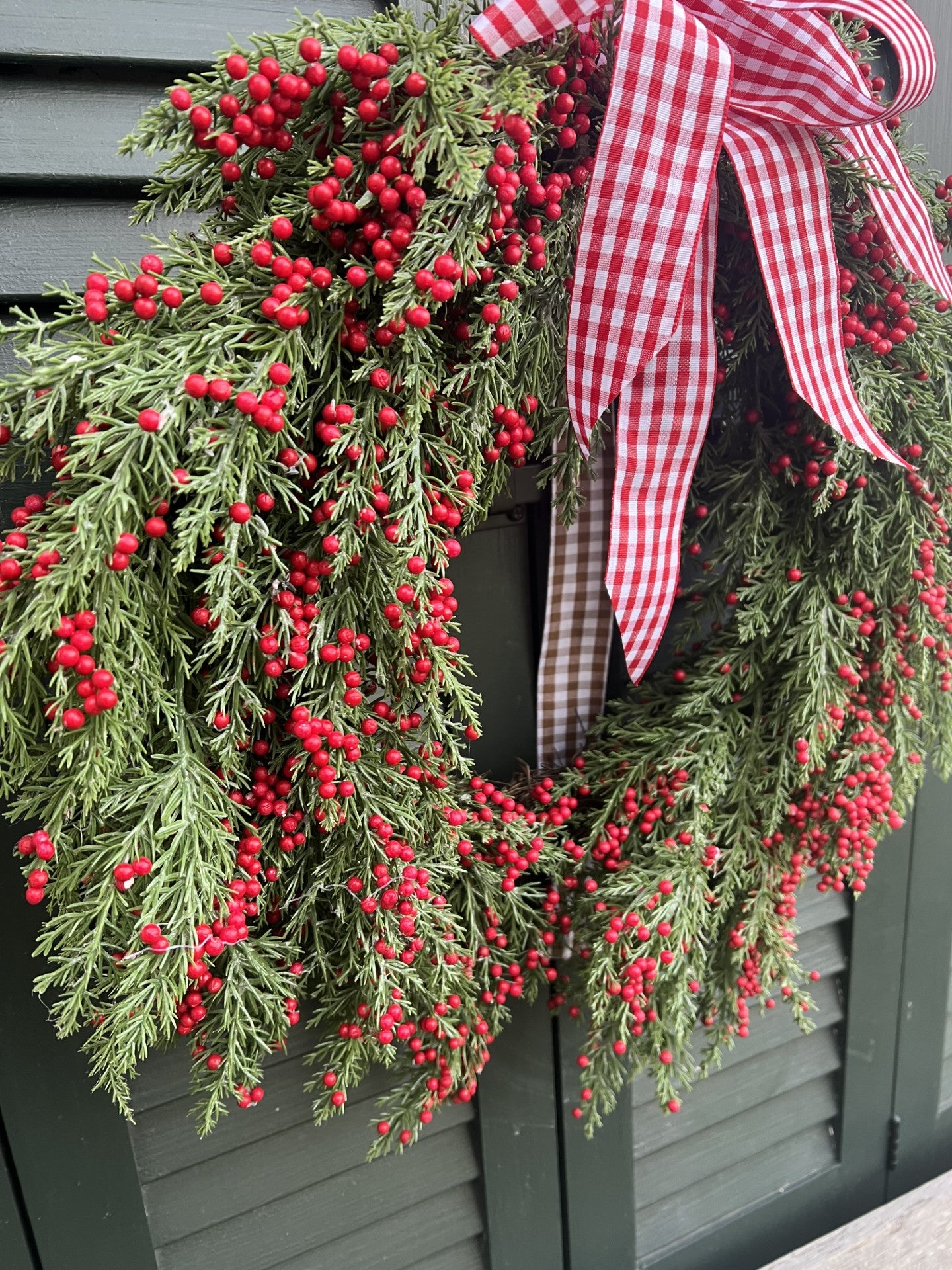 beautiful wreath with tiny red berries